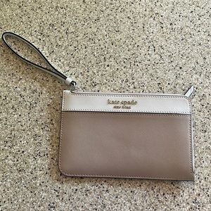 Kate Spade wristlet wallet.  Very pretty tan and cream. Excellent condition.